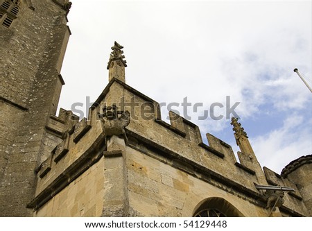 gargoyle on a gothic church in winchcombe, st peter\'s parish church, gloucestershire