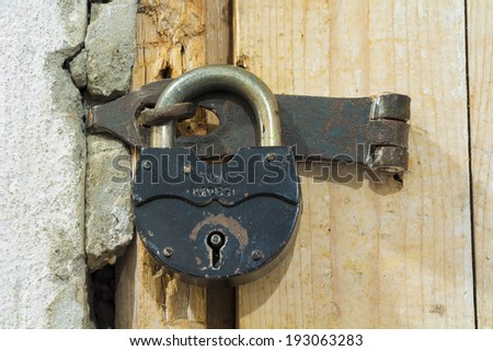 Door in the past. Old lock