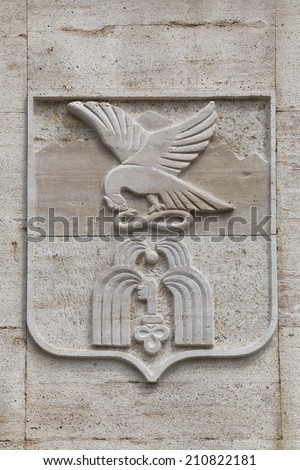 PYATIGORSK, RUSSIA - AUGUST 11, 2014: Coat of arms of the city of Pyatigorsk carved on a limestone slab
