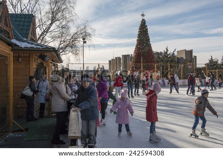 PYATIGORSK, RUSSIA - JANUARY 4, 2015: Open-air ice rink. Children and adults learn to skate