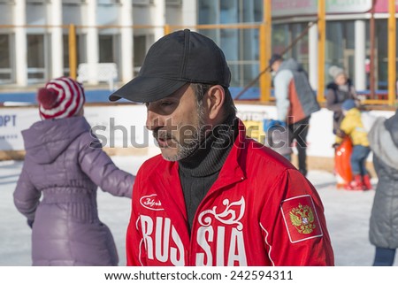 PYATIGORSK, RUSSIA - JANUARY 4, 2015: Trainer at the open-air ice rink