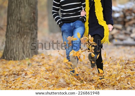 Pair of loving hearts walk in the autumn park