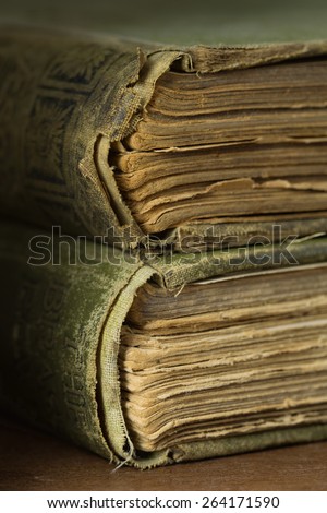 Macro of vintage book spines with shallow depth of field.