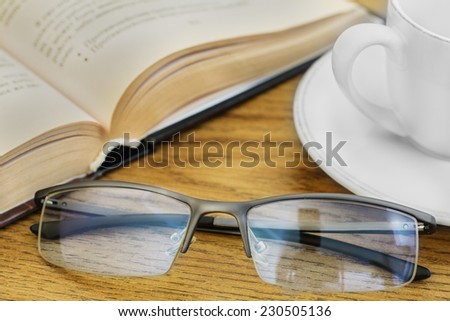 coffee glasses reading book library office