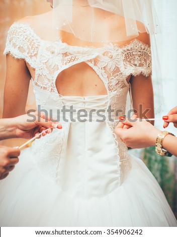 bride dressed in wedding dress, close-up, back, wedding, bride, bridesmaid dresses