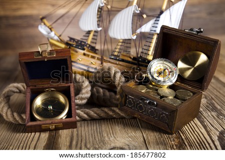 pirate ship, chest of gold, rope, compas