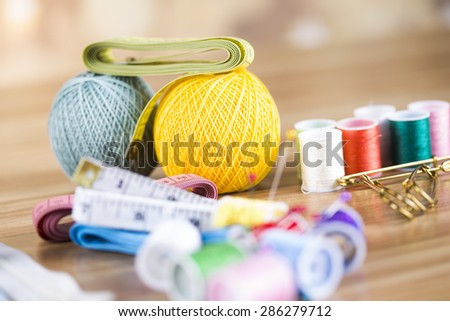 sewing machine and fabric, threads, needles, pins