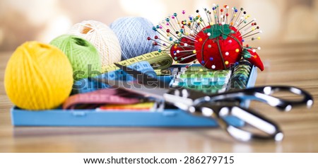 sewing machine and fabric, threads, needles, pins