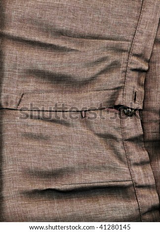 Trousers combined half-and-half with an unbuttoned button