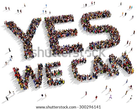 Large group of people seen from above gathered together to form the text \