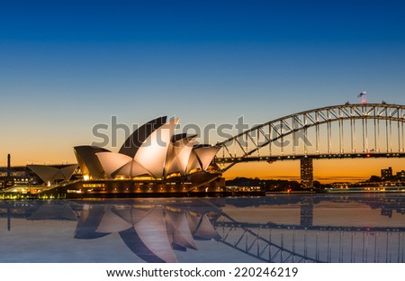 Sydney, Australia - May 16, 2014: The Sydney Opera House with Harbour bridge in Sydney Australia, Designed by Danish architect Jorn Utzon