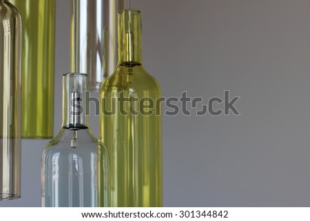 Modern lamp from wine bottle isolated on white background