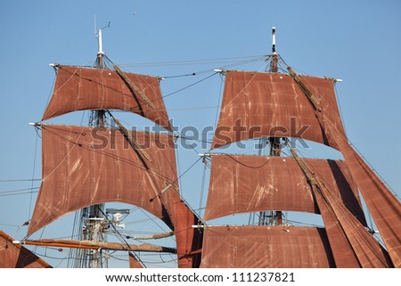 Detail of sailing ship, masts and sails of a tall ship