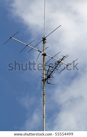 old tv antenna on a roof top