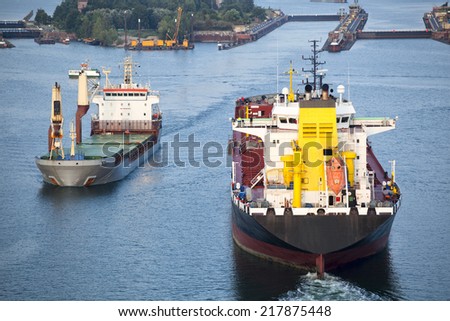 Tanker ship and freight ship on Kiel Canal, Germany