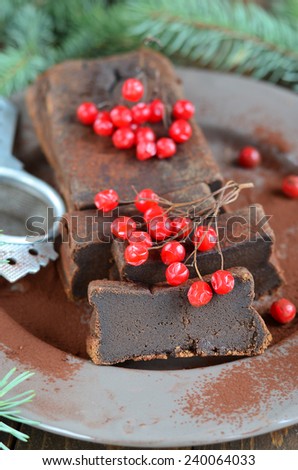 Chocolate gluten free cake with berries, selective focus vertical