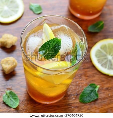 Lemon iced tea with mint, selective focus, top view