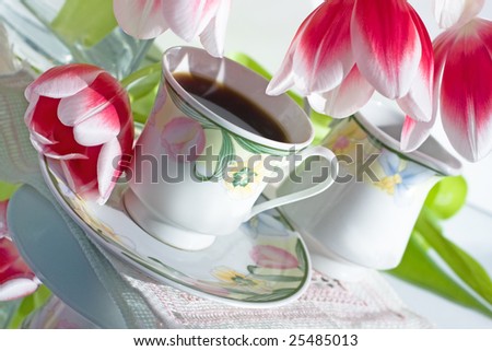 cafe and tulips in vase