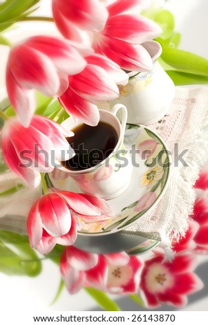 cafe and tulips in vase