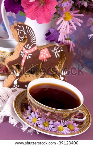 Still life with flowers and tea