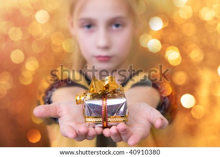 gift in the hands of girls
