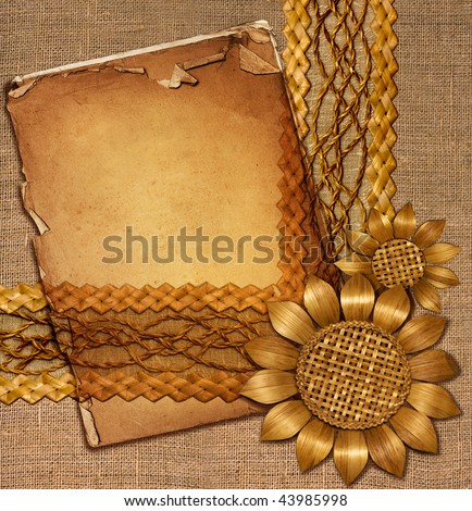 page of old papers and decor of woven straw