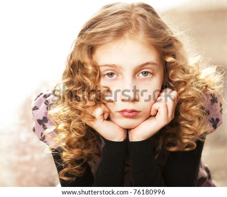 stock-photo-girl-with-curly-hair-sad-child-76180996.jpg