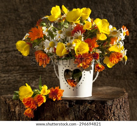 beautiful bouquet of bright wildflowers lit by sunset light