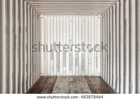 Inside an empty shipping container