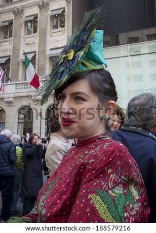 NEW YORK, NEW YORK Ã¢Â?Â? APRIL 20 2014: A woman talking about her bonnet at the Easter Bonnet Parade on 5th Avenue.
