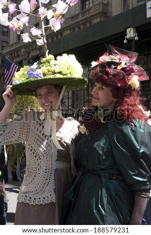 NEW YORK, NEW YORK Ã¢Â?Â? APRIL 20 2014: Women participating in the Easter Bonnet Parade on 5th Avenue.