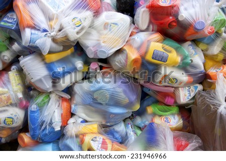 NEW YORK, NY - September 15, 2014: Empty laundry detergent bottles set out for recycling