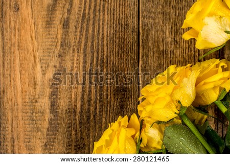 Flowers yellow roses on wood background photography