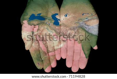 Map Of The Middle East Painted On Hands Showing Concept Of The Middle East In Our Hands