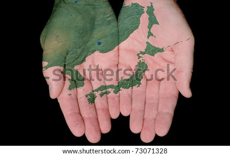 Map Painted On Hands Showing Concept Of Having The Country Of Japan In Our Hands