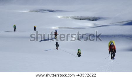 Roped team moving through a glacier, Tien Shan