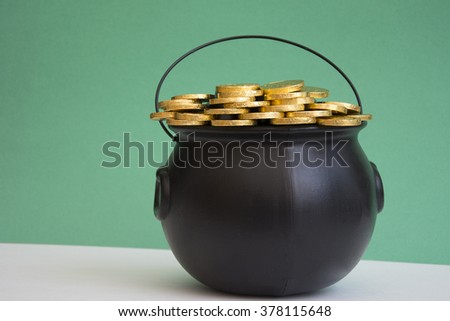 gold piled in caldron for st. patricks day
