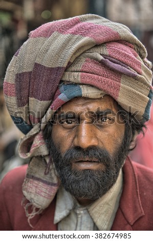 Old Delhi, India-March 15, 2013:Unidentified  Indian local man poses in the street of Old Delhi, India.