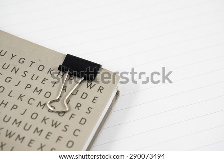 Wirebound notebook with black paper clip