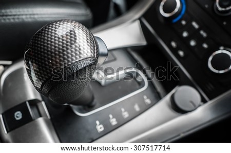 A gear stick, also known as a gearstick, is a metal rod attached to the shift assembly in a manual transmission-equipped automobile and is used to change gear.