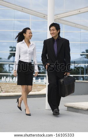 Business people leaving office building