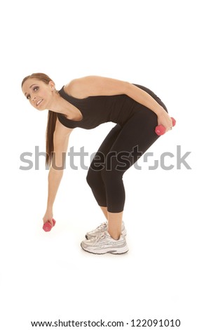 A woman having a hard time lifting up a little weight.