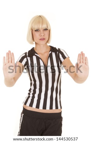 a woman referee calling a pushing foul