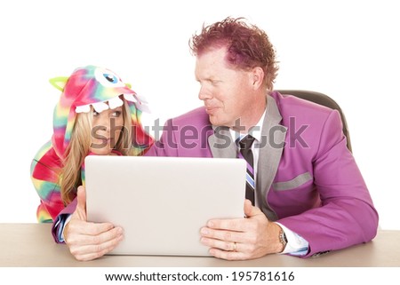 A business man holding his computer looking at a woman in her monster costume, with a smirk.