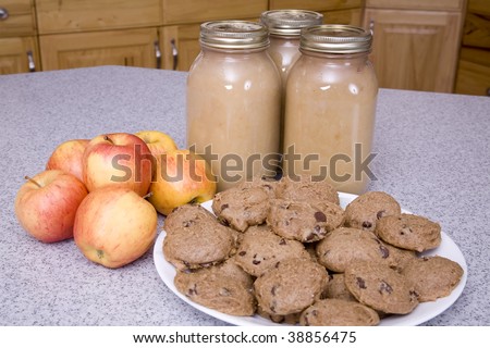A picture of all the things you can do with apples, applesauce,and chocolate chip applesauce cookies.