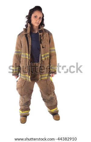 A woman firefighter standing with a serious expression on her face.