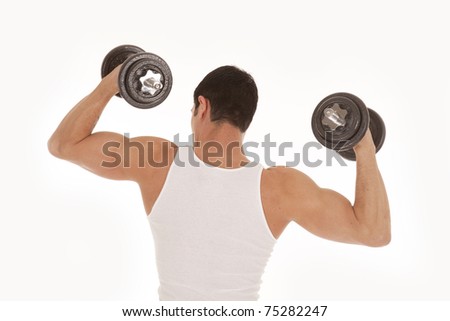 A view from the back of a man with his arms up and weights in his hands.