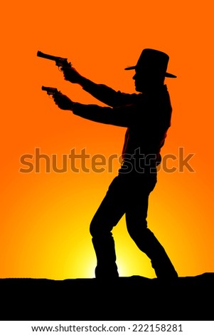 a silhouette of a cowboy pointing two pistols to the side.