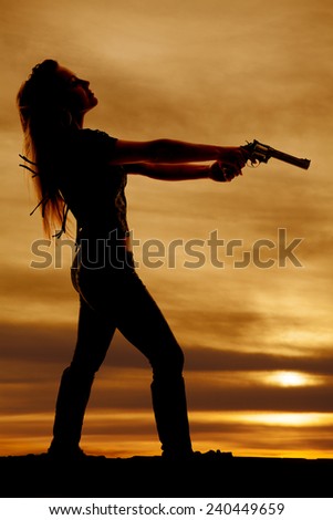 a silhouette of a woman pointing her pistol leaning her head back.