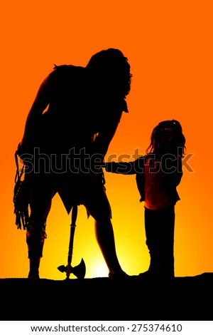 a silhouette of a cave woman with her little girl.